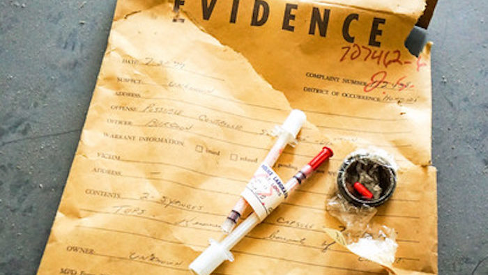 Photo of an envelope with evidence by Ashley Diener