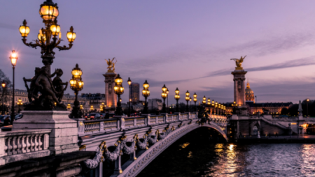 Paris' Pont Alexandre III, over the River Seine, at sunset.