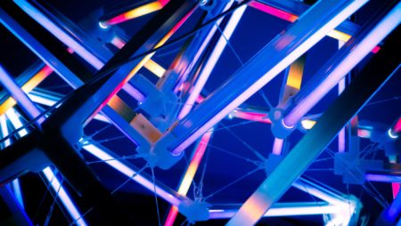 Brightly coloured strips of light criss-cross the screen