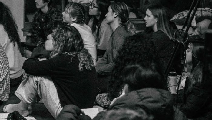 Picture of a group of women sitting on the floor