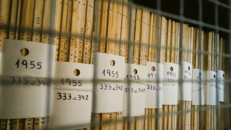 A picture of archived documents from 1955